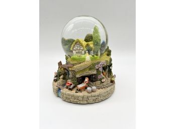 D-28 -DISNEY MUSICAL SNOW GLOBE - SEVEN DWARVES JEWEL MINE W/ Snow White PLAYS 'HI HO, HI HO' - 8'