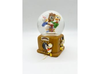 D-45- DISNEY MUSICAL SNOW GLOBE - Donald Duck & FAMILY DANCING TO RADIO - PLAYS 'IN THE MOOD'- 7'