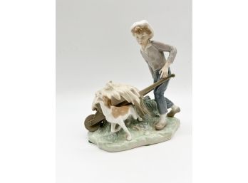 A-18- LLADRO FIGURINE - BOY PUSHING A WHEELBARROW WITH HIS DOG - 9' LONG BY 8' HIGH - PERFECT