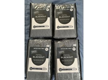 B-7- FOUR UNOPENED PACKAGES OF BLACK OUT CURTAINS - 84' LONG, GRAY WITH GROMMETS - BED, BATH & BEYOND