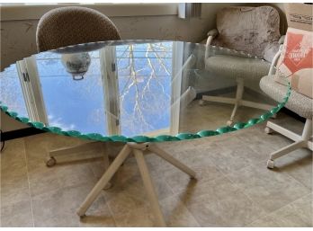 VINTAGE IRON BASE GLASS TOP KITCHEN TABLE WITH FOUR ROLLING CHAIRS - PIE CRUST EDGE - APPROX 48'