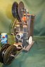 Keystone MovieGraph Projector With 3 Rolls Of Film, Model #59, Boston, 13'H  (107)