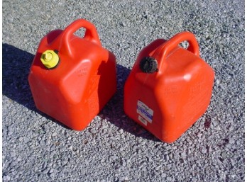 Two 5 Gallon Plastic Gas Cans Complete With Spouts And Caps  (249)