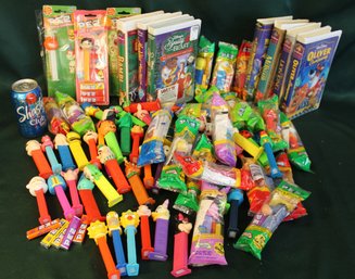 Large Pez Collection & 6 Disney, 1 Universal VHS Tapes  (186)