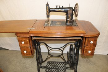 New Royal Treadle Sewing Machine In Oak 4 Drawer Cabinet, Missing Front Drawer, 34'x 18'x 32'H  (324)