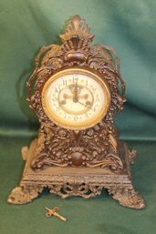 An Tique Pot Metal Waterbury, Ct. Shelf Clock W/key & Pendulum, Pat. 1898, 11x8x14'H     (85)