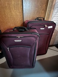 Lot Of Two Purple Rolling Luggage Suitcases