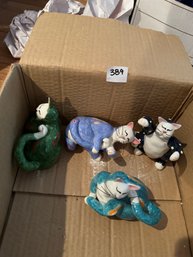 Family Of Ceramic Cat Figurines