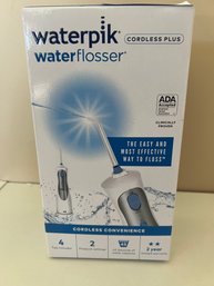 Brand New In Box Sealed Water Pic Water Flosser Cordless Plus