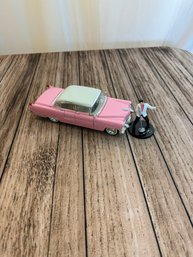 Elvis Figurine & Pink Cadillac Die Cast Model Car
