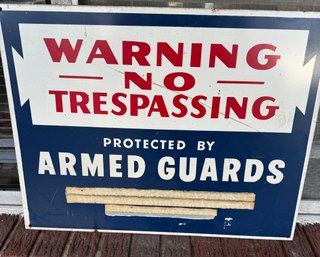 Metal Sign Warning No Trespassing Protected By Armed Guards