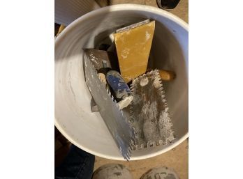 Bucket Of Trowels And Drywall Tools