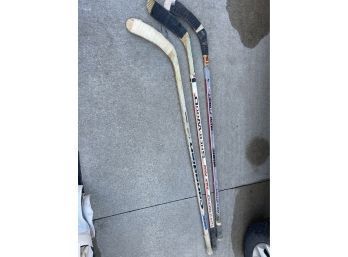 Lot Of Three Hockey Sticks