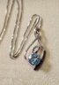 Sterling Silver Swiss Blue Topaz Black And White Diamond Necklace