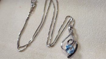 Sterling Silver Swiss Blue Topaz Black And White Diamond Necklace