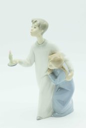 Lladro Boy In Night Shirt Matte Finish Figurine