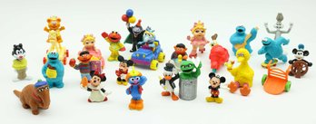 Assortment Of SESAME STREET, Mickey Mouse, Muppet Babies, PVC Muppet Figurines And More
