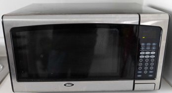 Oster 1.3-Cu.-Ft. Countertop Microwave - Stainless Steel Trim