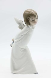 Curious Angel Figurine Lladro