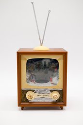 Lighted Musical Animated Retro TV Set Decoration Featuring Vintage Outdoor Snow Winter Scene With Ice Skaters