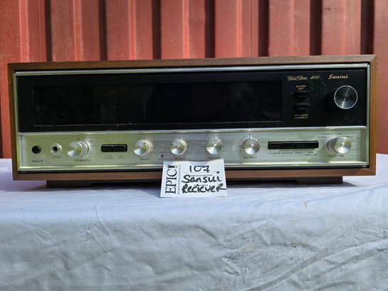 Lot 107  VTG. Sansui Solid State Stereo Receiver