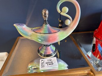 Lot 116 NUHA: The Genie Of The Lamp Of Knowledge Ceramic Oil Lamp, 11' X 10'