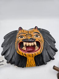 Lot 271 African Lion Wooden Mask & Frog Guiro Instrument: Tribal Artistry & Rhythmic Tradition