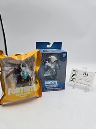 Lot 338 Set Of 2 Fortnite Action Figures - Ragnarok Series 1 (the Cold Harbinger Of Fate) - (frozen Raven)