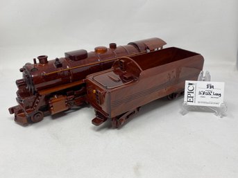 Lot 334 Wooden Steam Train Model - Classic And Nostalgic Decor Piece For Train Enthusiasts.