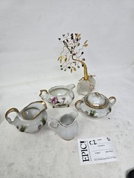 Lot 21 Set Of Japanese White Porcelain Rose Pattern Creamers And Sugar Bowl, And Crystal Money Tree