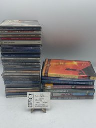 Lot 123 Assorted CD's And DVDs Movies, Not Checked