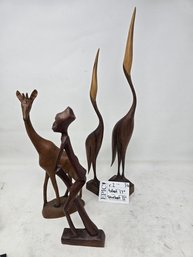 Lot 36 17' Tall Wood Craft Heron, Small Heron, Giraffe, And Human Figure.