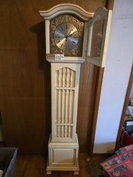 Lot 226 Elegant Butler Grandfather Clock: 9'x16.5'x69', Timeless Charm For Your Home Decor.