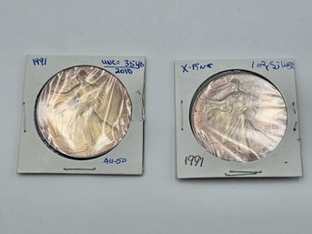 Item 7 Silver Dollar Pair: 1991 Uncirculated & Extra Fine, 2010 About Uncirculated 50