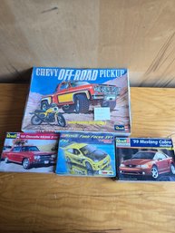 Lot Of 4 Revell Model Kits: 1/16 Chevy Off-Road Pickup, 1965 Chevelle SS, Ford Focus SVT, '99 Mustang Cobra