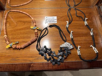 Lot 109 3 Wooden Carved Animal Necklaces