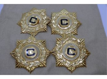 Set Of 4 Tin Medallions With A C Center