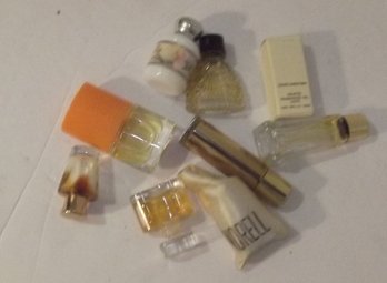 Nine Different Mini Perfume Bottles For Wearing Sampling Or Displaying