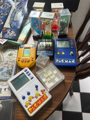 Table Lot Of Video Games Cards And Sports Collectibles