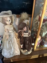 Collection Of Dolls And Cases