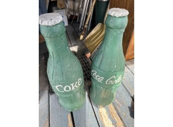Pair Of Cast Concrete Coke Bottles