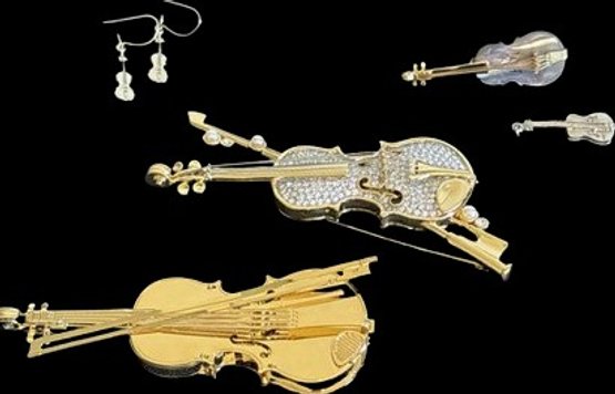 Assorted Silver And Gold Tone Violin Jewelry