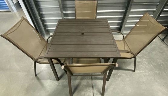 Metal Patio Table (38Lx38Wx28H) With Four Matching Patio Chairs (27Lx21.5Wx37.5H)