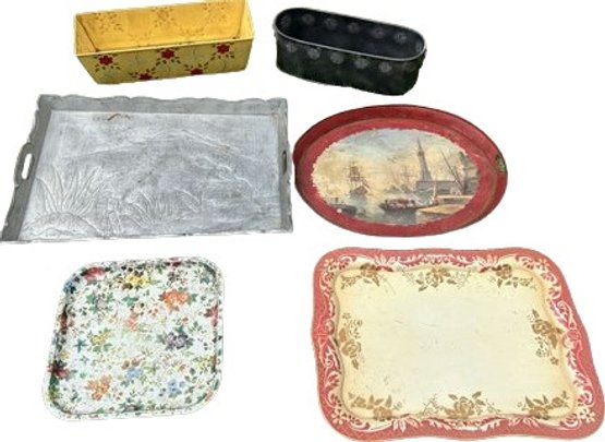 Four Decorative Metal Serving Trays And Two Small Planter Boxes
