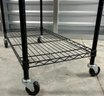 A Black Double Rod Garment Rolling Rack With Wheels - 35x18x76