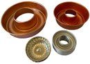 A Pair Copper Colored Jello Molds And 2 Mini Aluminum Molds