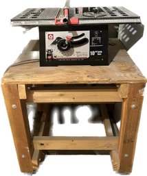 Working Sakura Table Saw (27x18x12) & Rolling Wooden Workshop Table(29x29x30)- Saw Is Attached To Table.