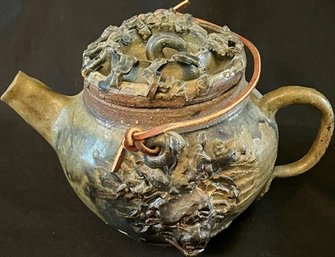 Intricately Carved Pottery Tea Pot