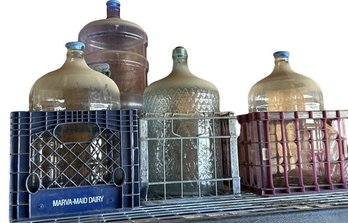 Glass & Plastic 5 Gallon Water Jugs In Crates