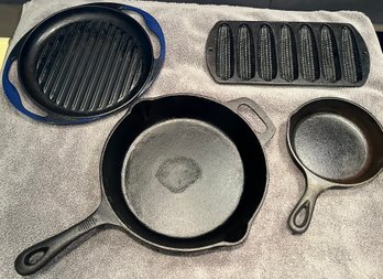 Cast Iron Griddle 12.5, Large Skillet 11, Small Skillet 6.6 & Corn Tray 12